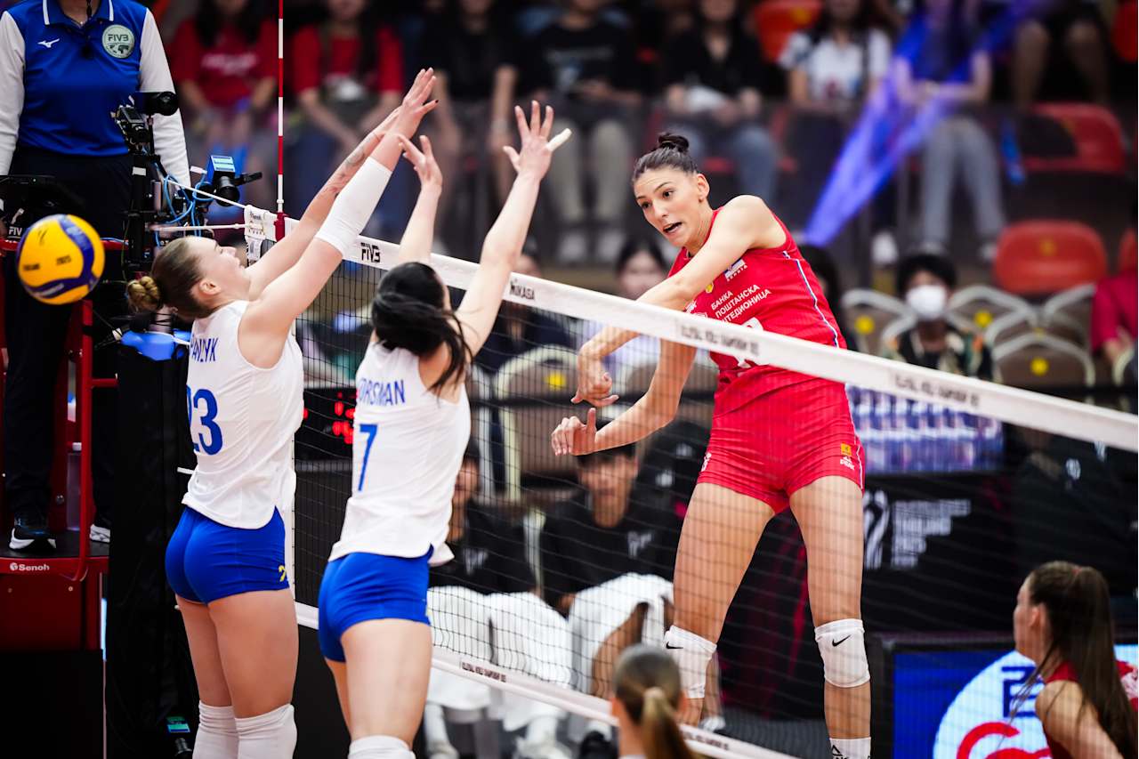 Tijana Bošković of Serbia celebrating a point, demonstrating the defending champions` early dominance.