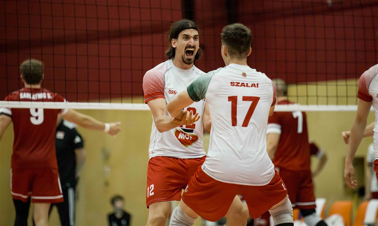 Hungarian and Austrian volleyball players during a match