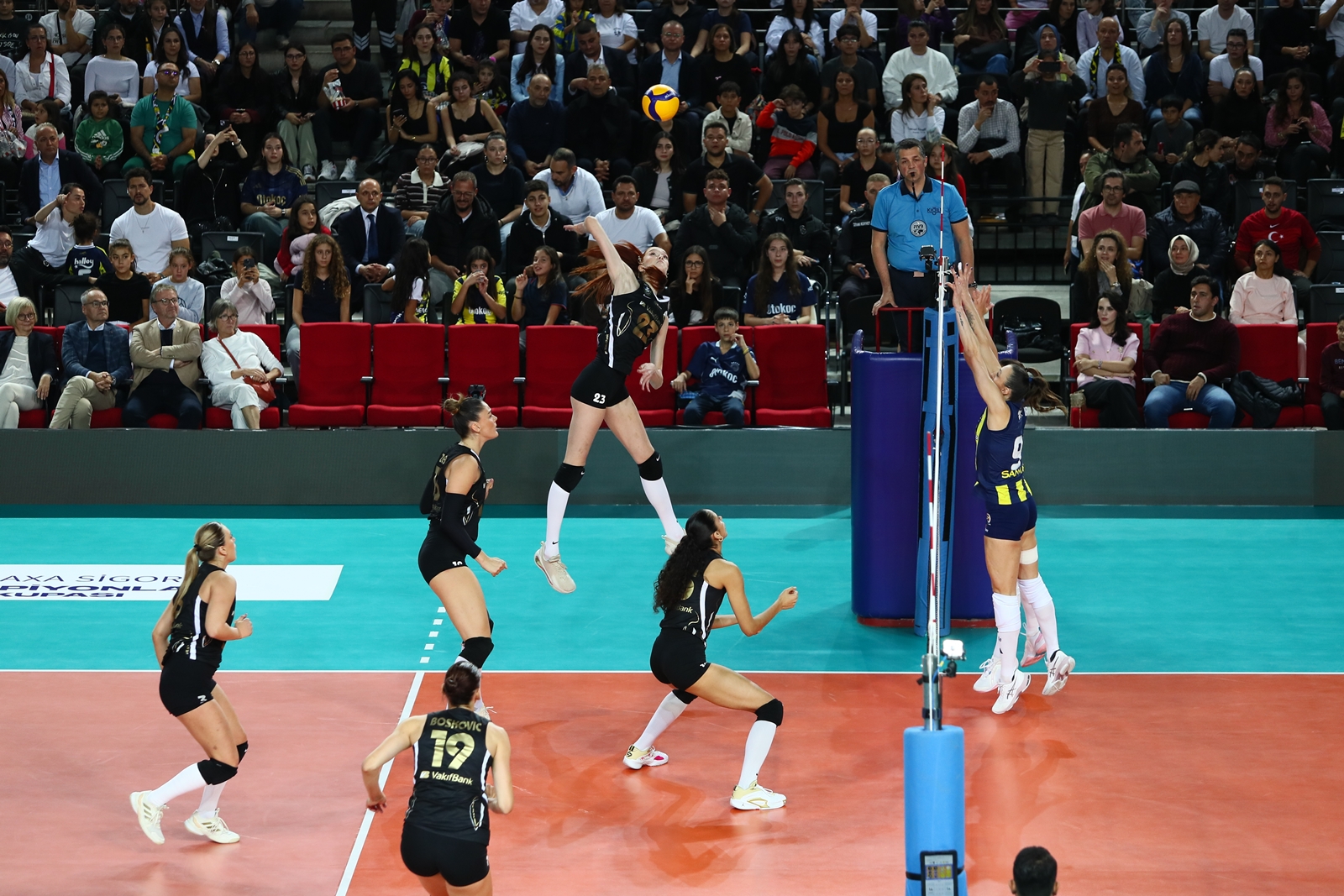 VakifBank players celebrating a point