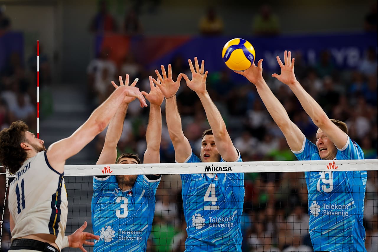 Volleyball players in action during a match