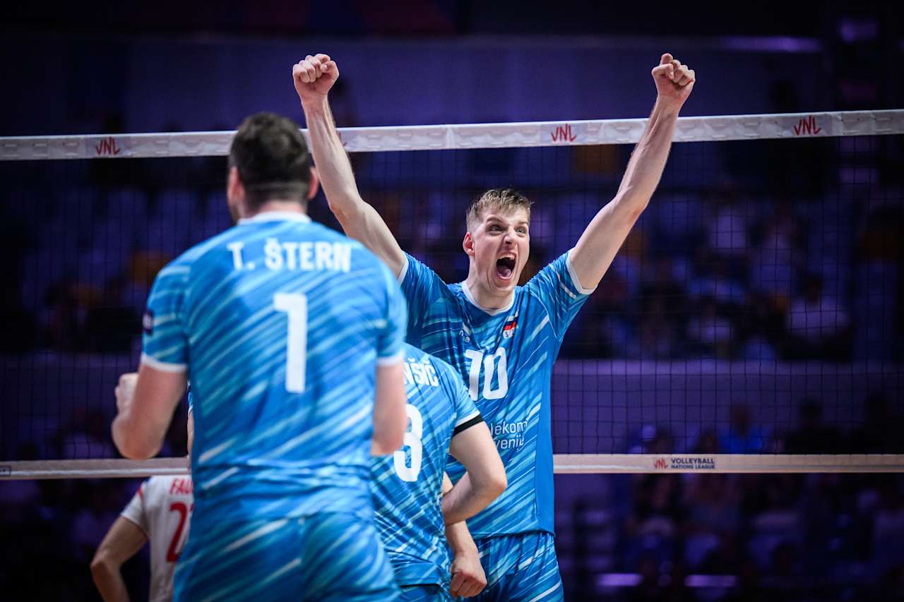 Volleyball players in action during a match