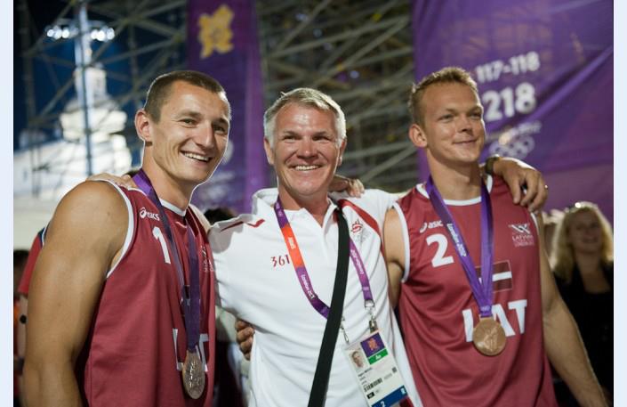 Birzulis celebrating the London 2012 Olympic bronze with Plavins & Smedins