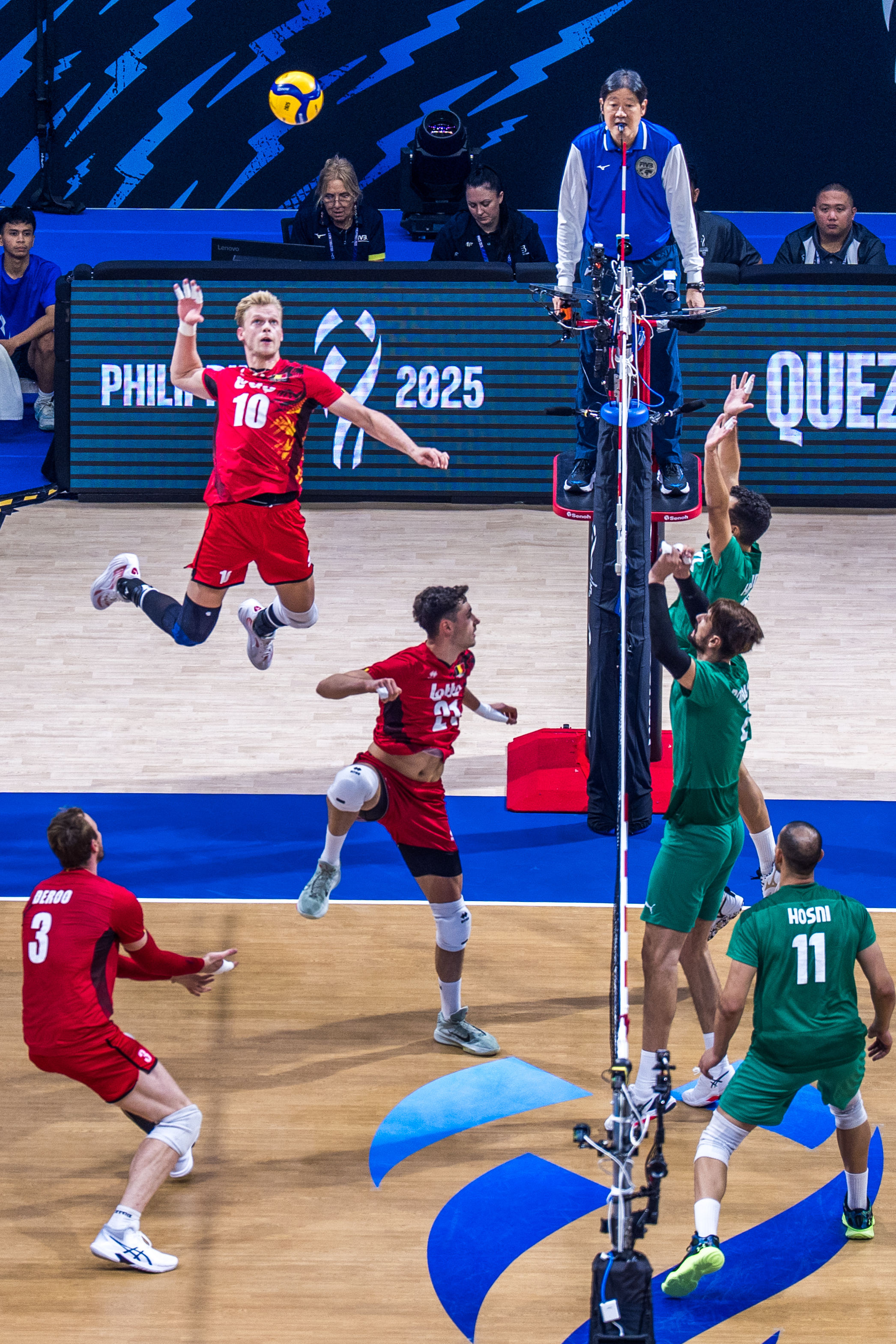 Volleyball players on court during a match