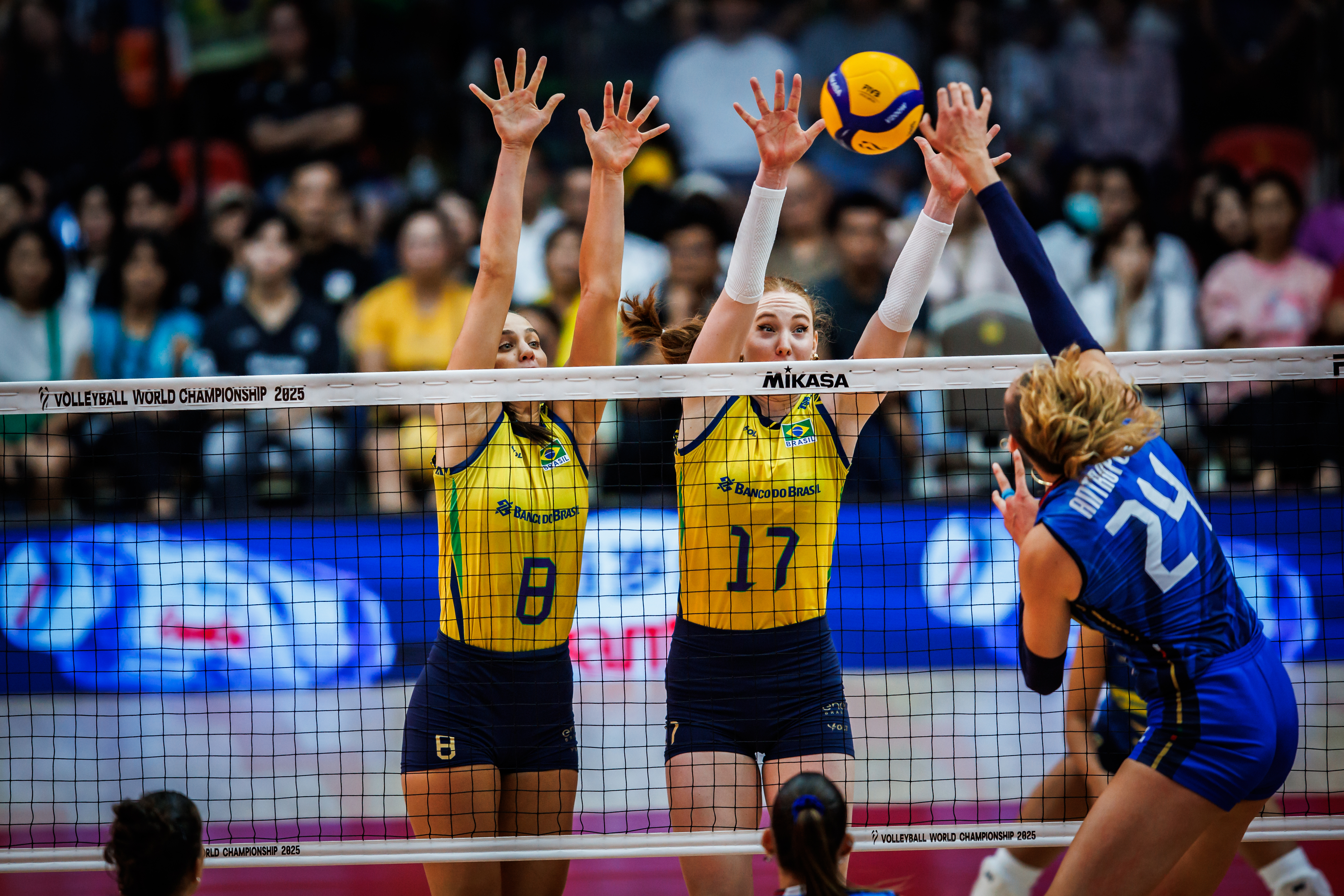 Volleyball players celebrating