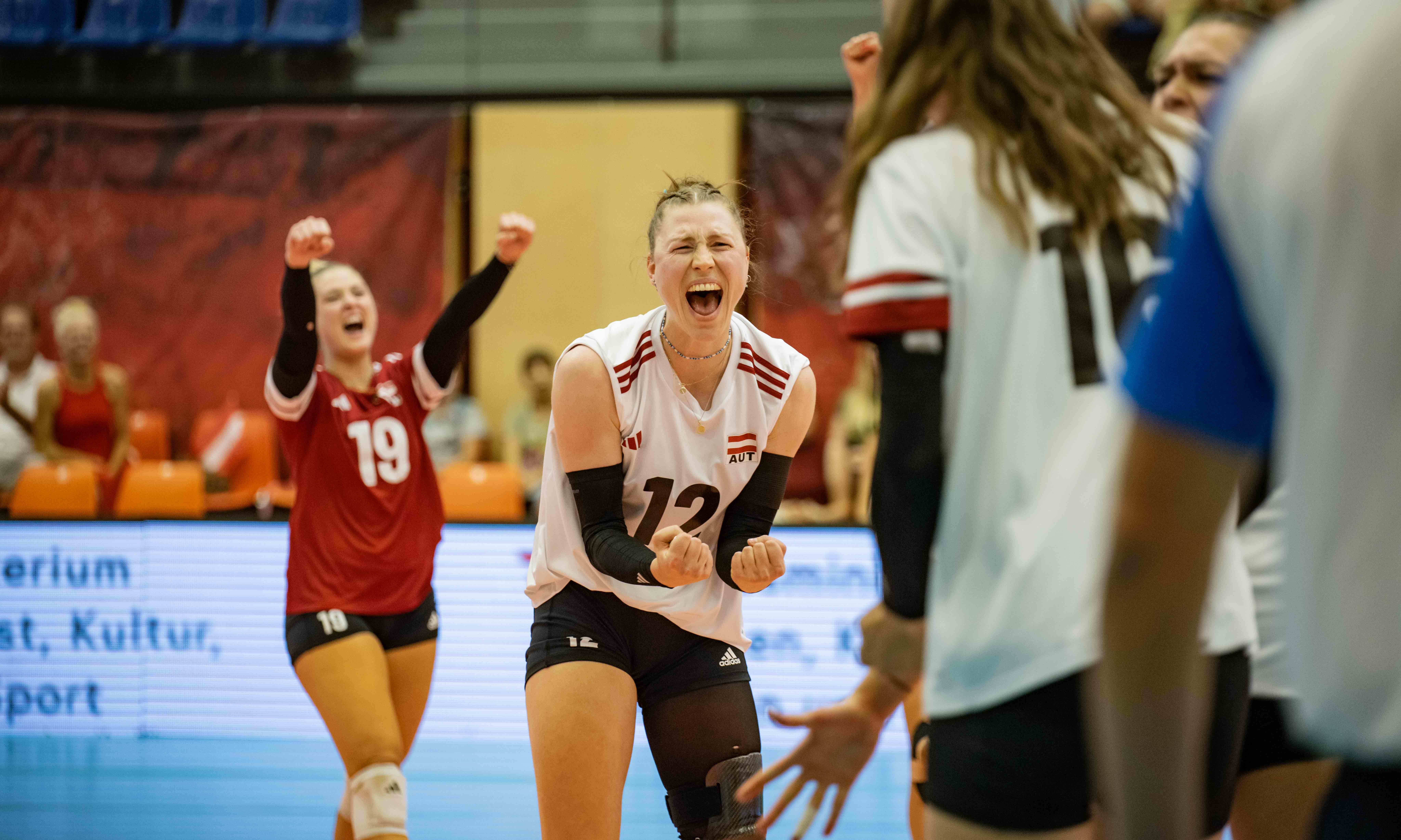 Team Austria celebrating victory against Latvia
