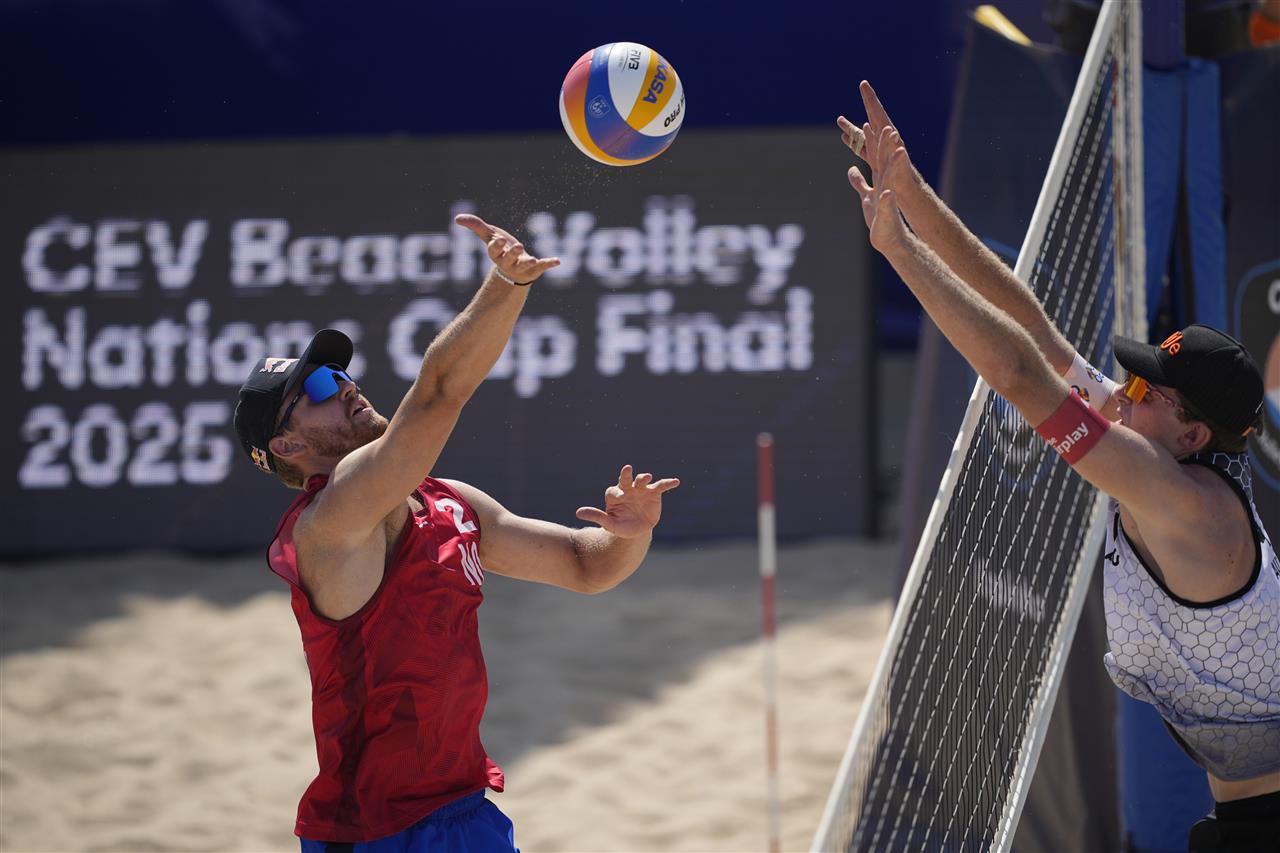 Norwegian beach volleyball players Anders Mol and Christian Sørum in action.