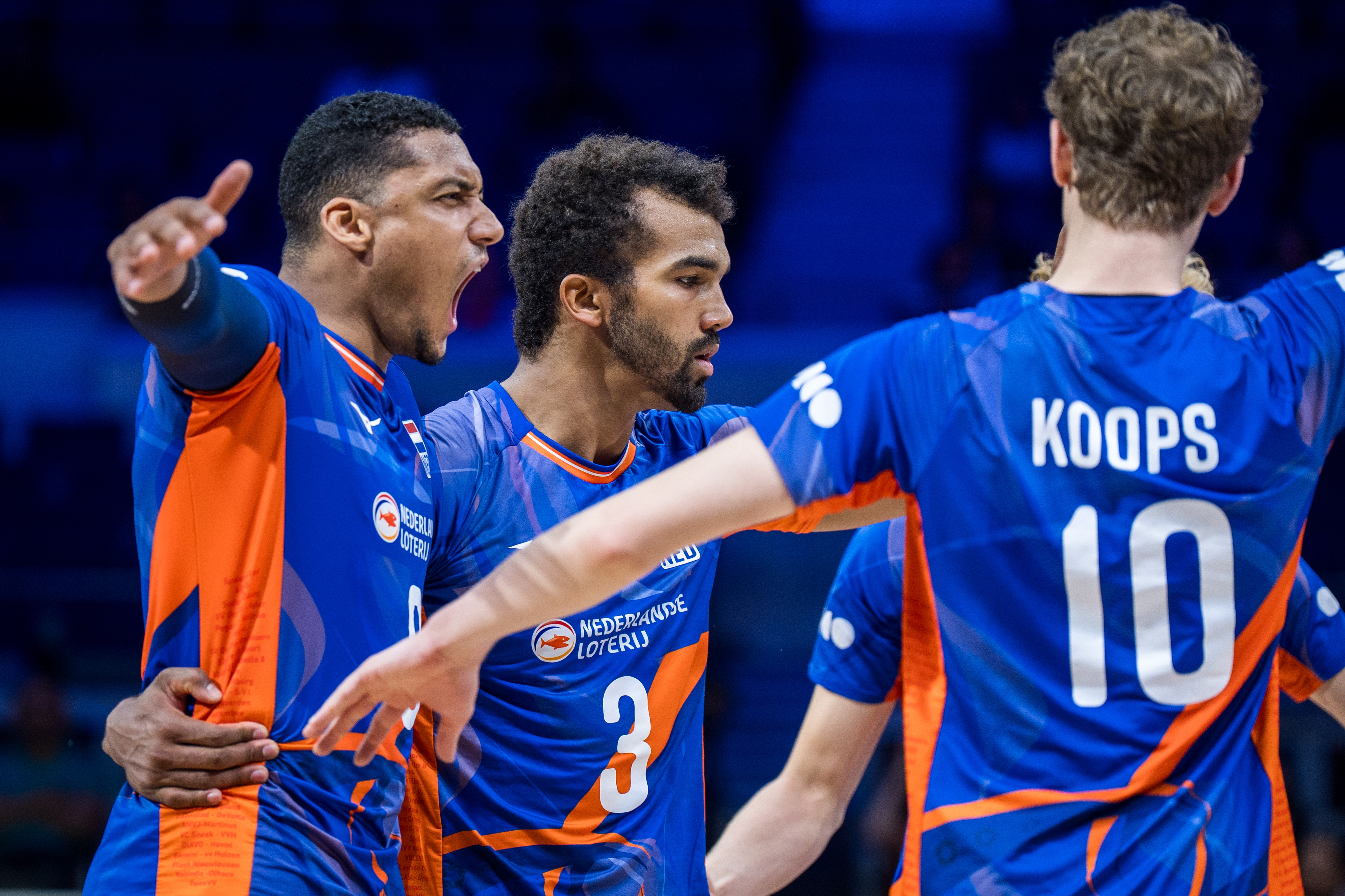 Volleyball match action