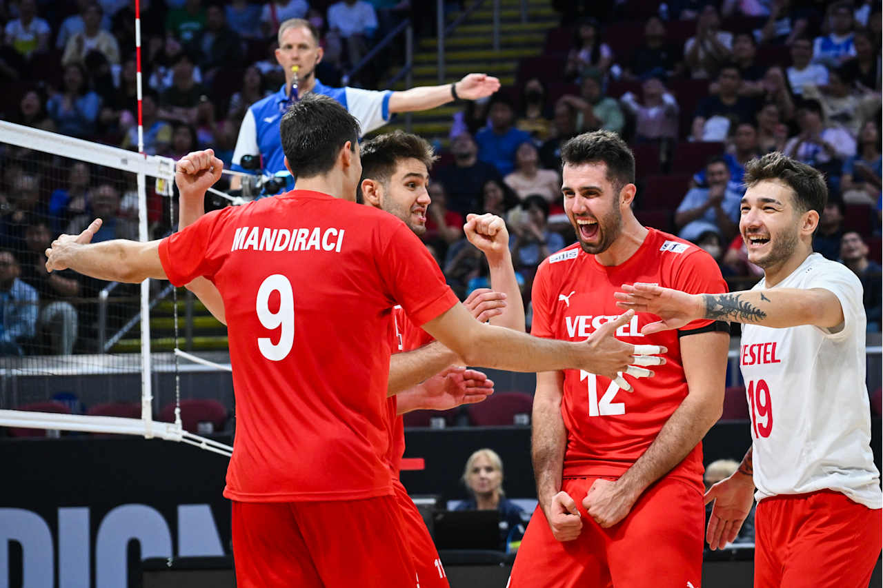 Türkiye Men`s Volleyball Team celebrating a historic win