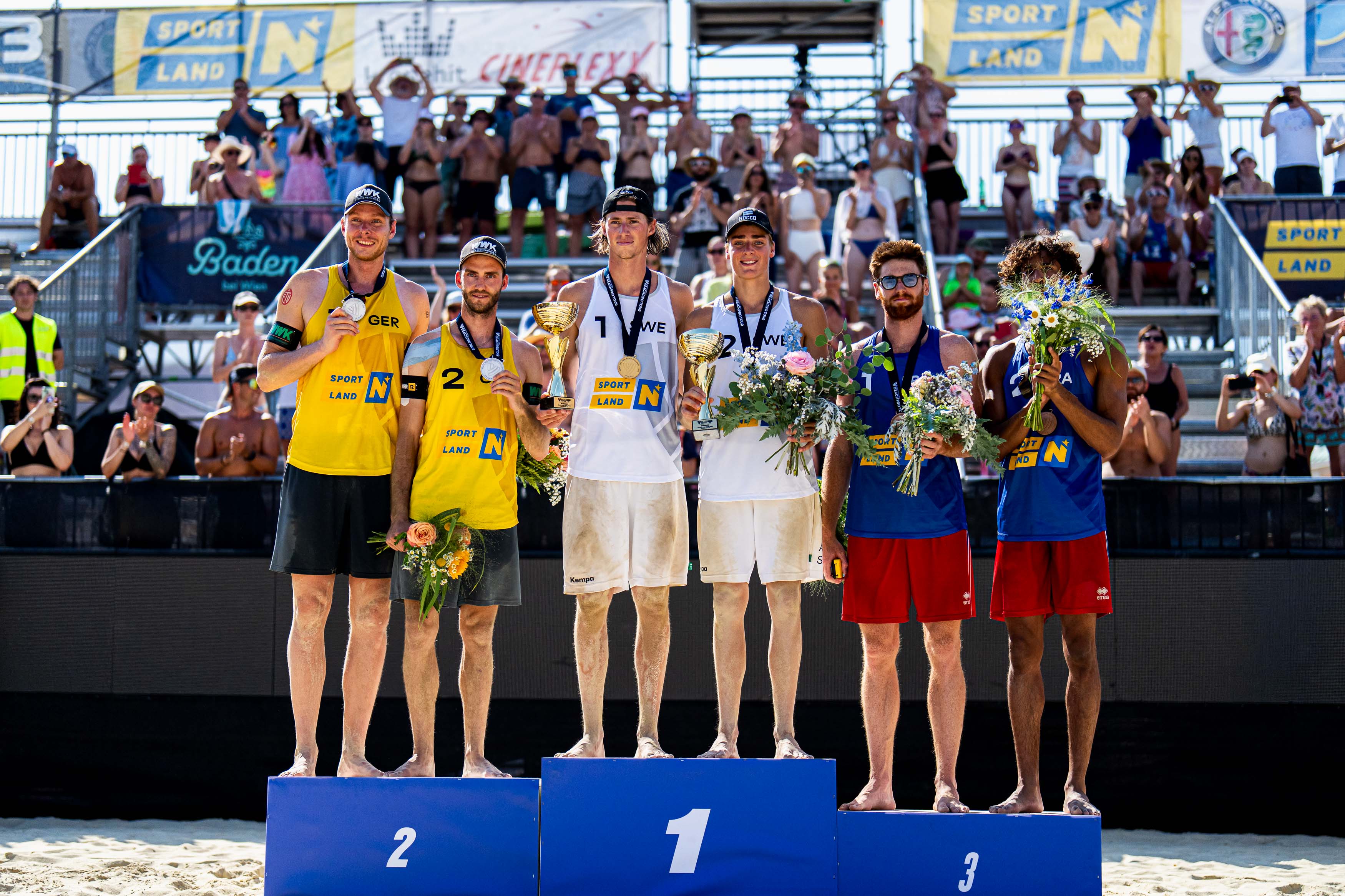 Men`s podium in Baden with teams from Sweden, Germany, and France celebrating.
