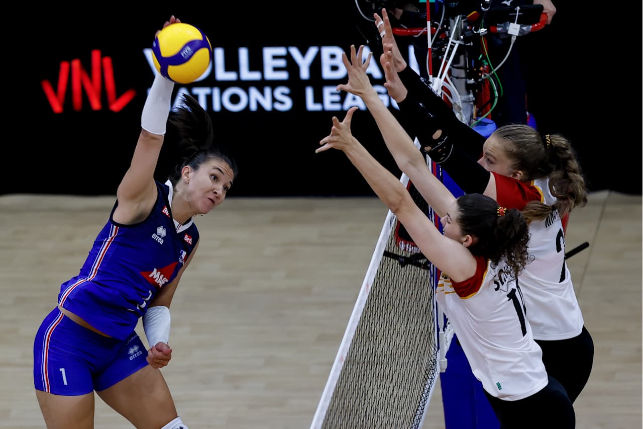 Volleyball player hitting the ball