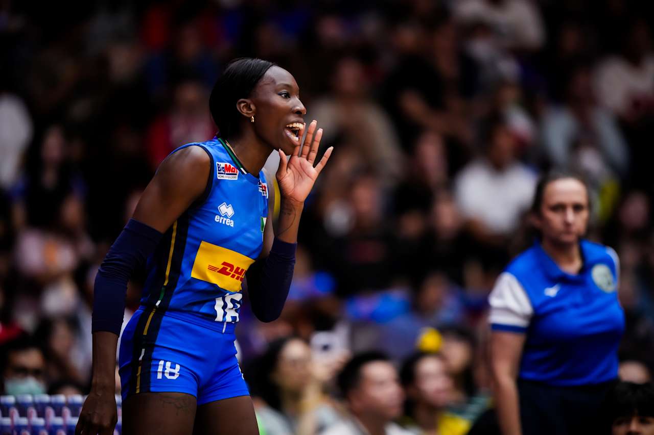 The Italian volleyball team celebrating a crucial point.